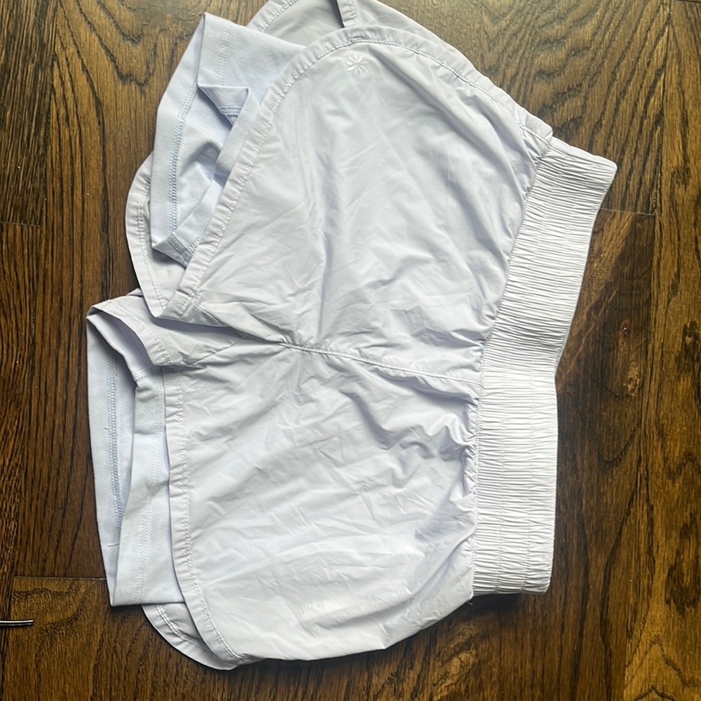 Athleta girl M 8-10 lilac short medium with liner (color is periwinkle)